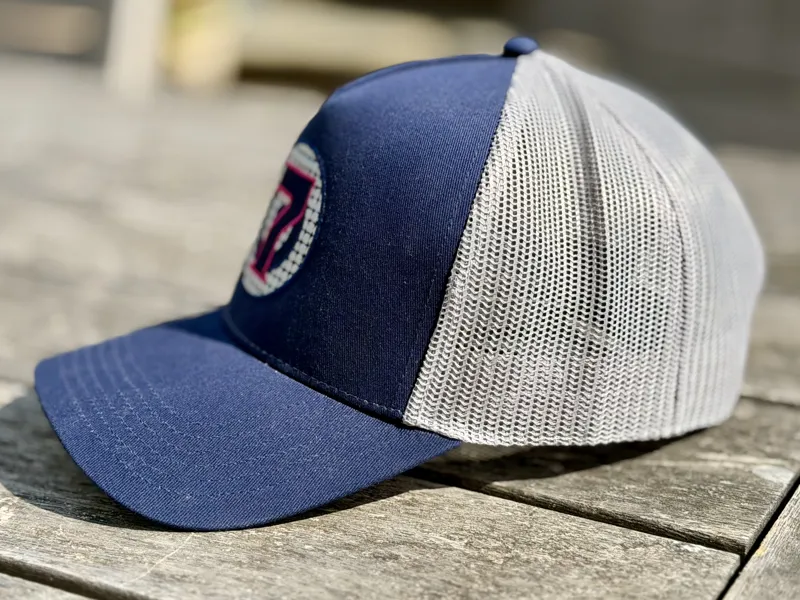 Super 7 Trucker Cap with adjustable back in navy and pale grey with a blue pink logo-2